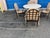 Kreiss patio table and 4 chairs. Table is hollow iron base with travertine top. The chairs are Capri Patio chairs. Kreiss...