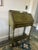 Charming vintage secretary desk in a beautifully aged olive green finish, adorned with hand-painted floral bouquets on...