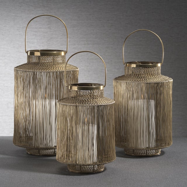 Add a striking decorative element to your space with the Menorca Decorative Metal Lantern. Featuring a woven, twisted...