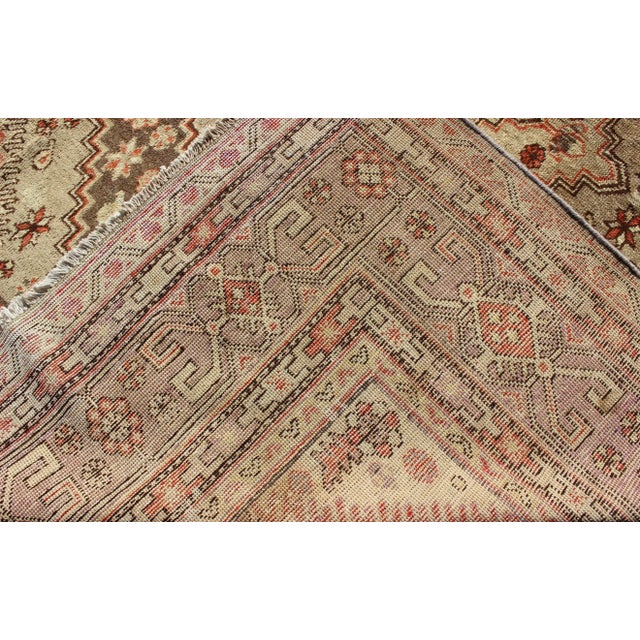 Early 20th Century Antique Khotan Rug With Paired Diamond Medallions in Brown and Earth Tones For Sale - Image 9 of 10