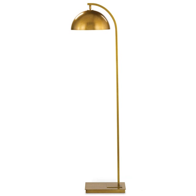 Otto's modern silhouette is accented with sleek design elements like its swiveling, matching metal shade and arching neck....