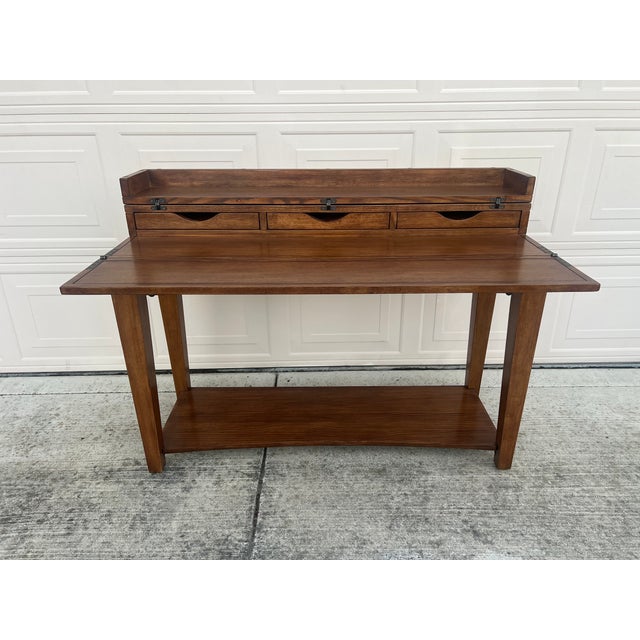 This handsome piece is both stylish and functional. A perfect table for your entry way or the practical piece as a...