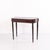 Mahogany games table with turned tapered legs dating from the 1880s. The table features a classic design with a folding...