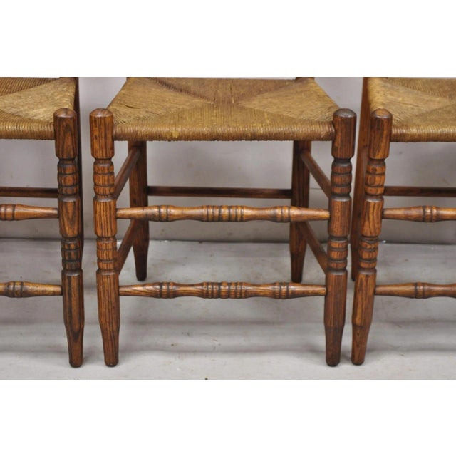 Wood Antique Ladderback Primitive Rustic Oak Wood Rush Seat Dining Chairs - Set of 4 For Sale - Image 7 of 11