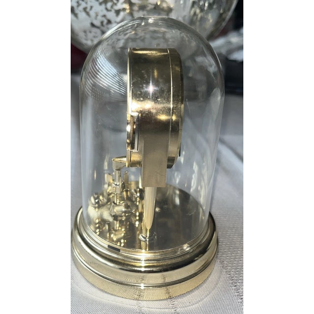 Add timeless elegance to your shelf, desk, or curio cabinet with this **Vintage HCI Elgin Quartz Movement Mini Dome...