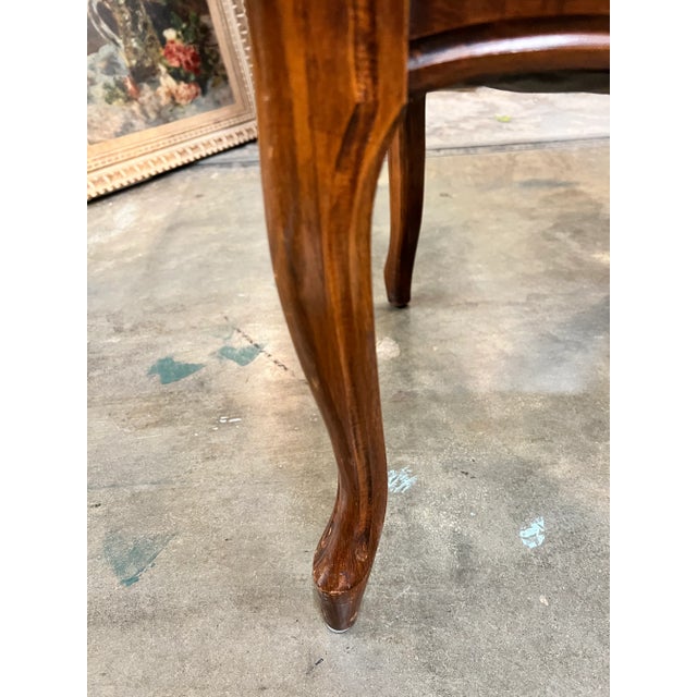 Beautiful French wooden mahogany needlepoint arm chair dates to the early 1900’s..The chair is needlepointed front, back...