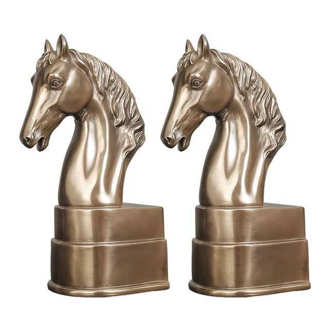 This is a striking and substantial pair of sculptural bookends, featuring detailed horse heads. The horses are crafted...