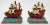 Wonderful vintage pair of cast aluminum bookends featuring ship motif. Each is enamel painted in red, white and blue,...