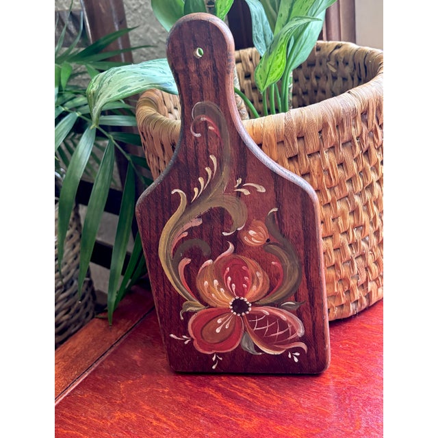 Small but charming hand-painted wooden cutting board, perfect touch for a rustic kitchen. Most items found at Pub & Oasis...