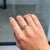 This elegant ring showcases a 0.85 carat natural oval yellow sapphire, set in 14k white gold. The center stone measuring...