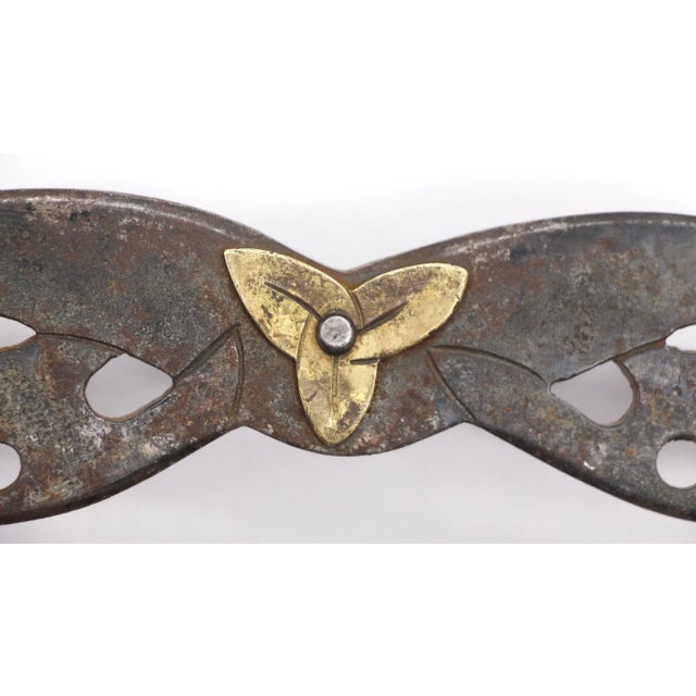 Long cast iron trunk or luggage pull with a center brass foliate decoration. This is in great condition. One available....