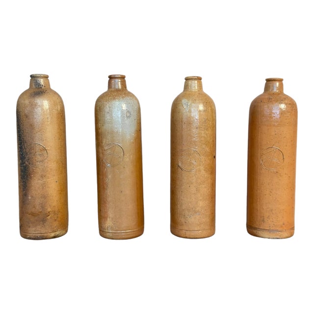 Set of Four Antique Stoneware Bottles For Sale