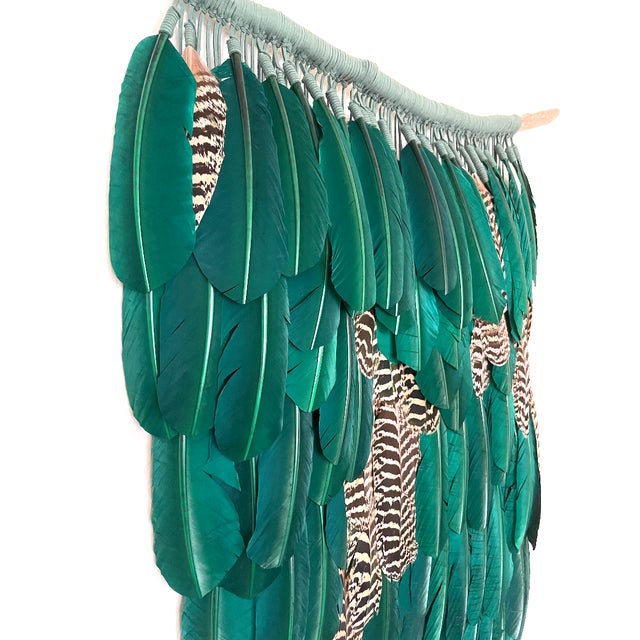P A R A D I S E No. 4 Kristen Leigh Baker | 2026 Medium: Ethically sourced tropical green feathers, exotic mottled peacock...