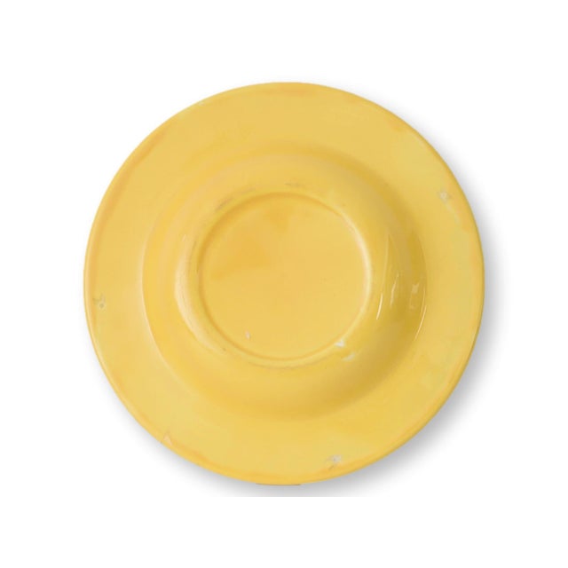 This vintage yellow advertising dish features an embossed eagle at center with raised “Beverly’s Eagle Ale” lettering...