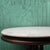 This table is uniquely designed with a dark stained frame and a white marble top. It sits on casters, making it easy to...