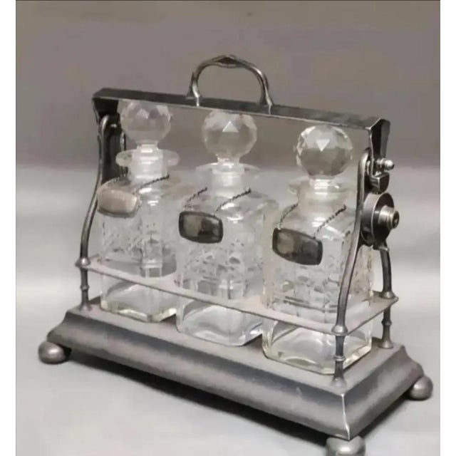 Early 20th Century English Silver Plate Three Bottle Tantalus Set- 4 Pieces For Sale - Image 4 of 10