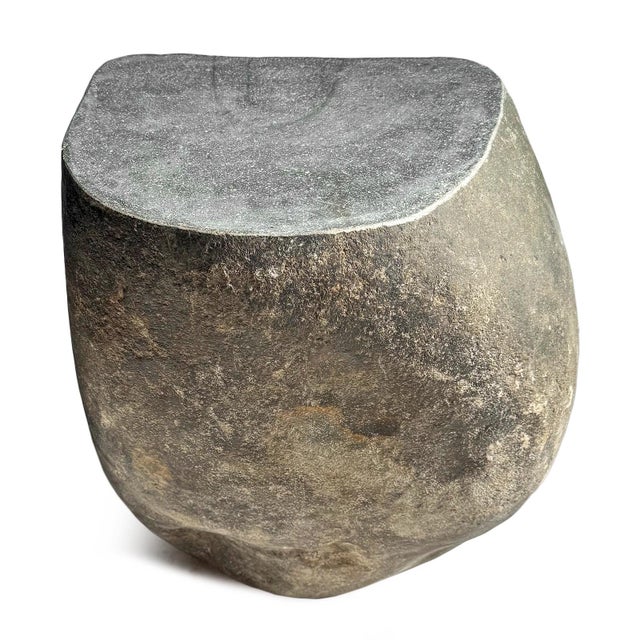 Solid heavy stone boulder vintage outdoor side table or stool. This rustic organic modern piece will look beautiful and...