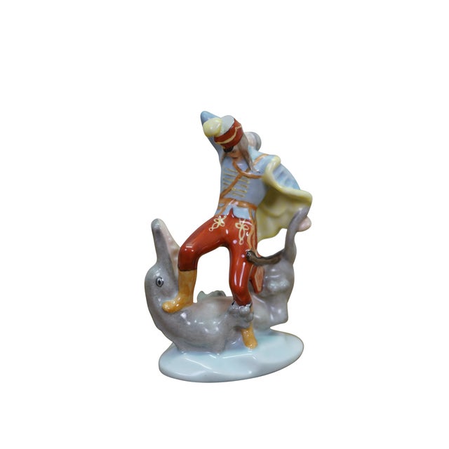 This Herend Porcelain "Brave János Dragon Slayer" miniature figurine (model number 5595) beautifully captures the climax...