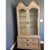 Offered is a vintage illuminated display cabinet by Union Furniture. This one-piece cabinet features two cabinet doors...