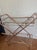 Fun and functional mid-century bar cart in a rose gold finish. The faux bamboo look and compact size make it a great fit...