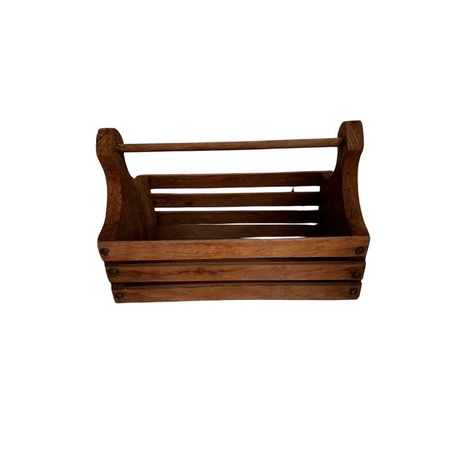 Beautiful vintage wood carrying crate with brass hardware. Perfect for accessorizing any room.