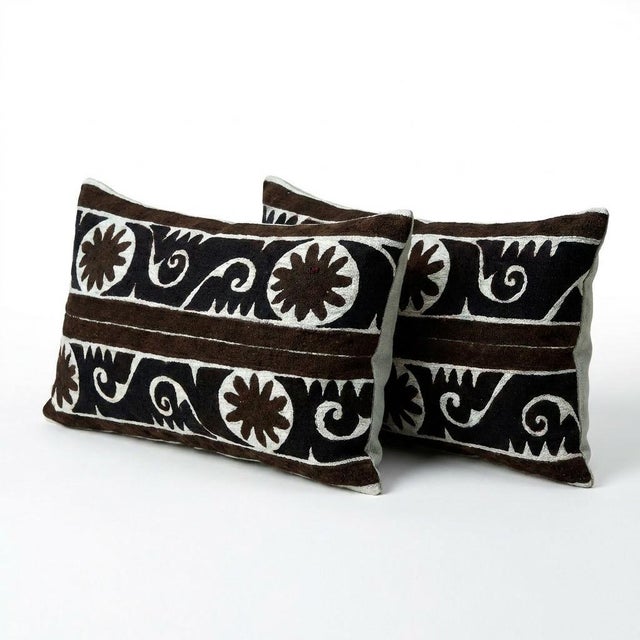 This beautiful 15'' x 24'' hand-embroidered Suzani pillow cover set was made from authentic Uzbek cotton fabric. The...