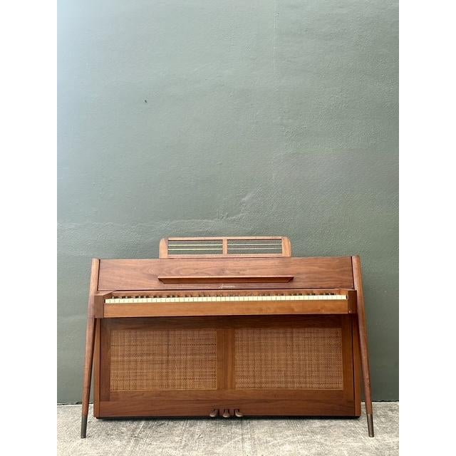 The Baldwin Acrosonic is a legend of Mid-Century Modern design, celebrated for packing a full, resonant sound into a...