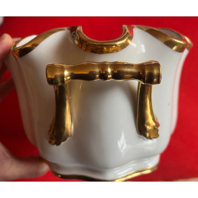 Antique early 19th century French Empire Paris porcelain monteith or cachepot. Decorated with expert gilding on a bright...