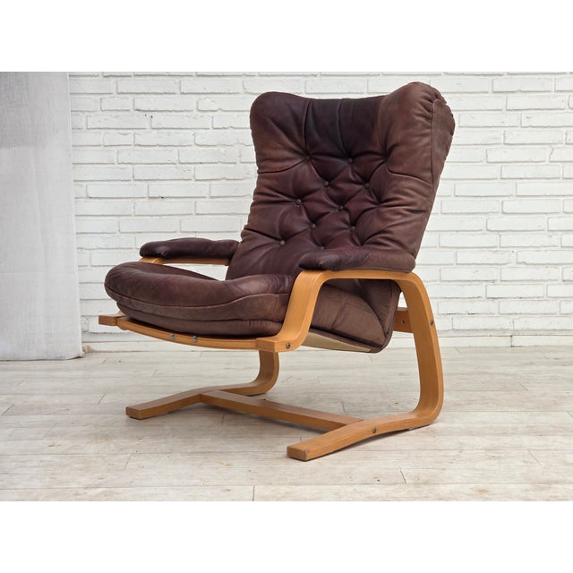 1970s, Scandinavian adjustable armchair. Original brown furniture leather with patina, bent wood. Original good condition:...