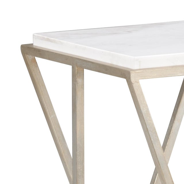 Antique silver leaf finish on iron pedestal with natural white marble top