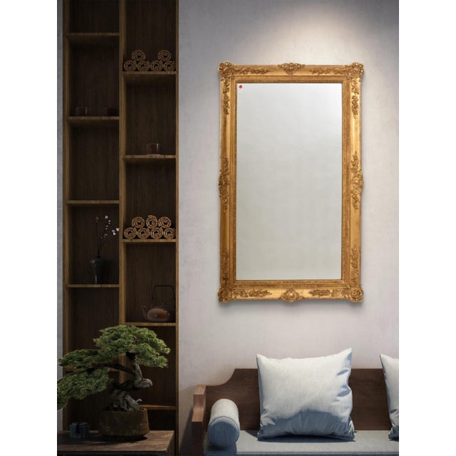 This beautiful Antique Gilded Rectangular Mirror, dating from the mid-19th century, features floral decorations engraved...