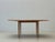 This elegant extendable wooden dining table impresses with its timeless mid-century design, clean lines, and exceptionally...