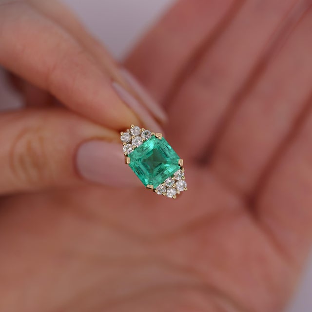 GIA Certified 4 Carat Square Octagonal Cut Minor Oil Colombian Emerald and Round Diamond Engagement Ring. This GIA...