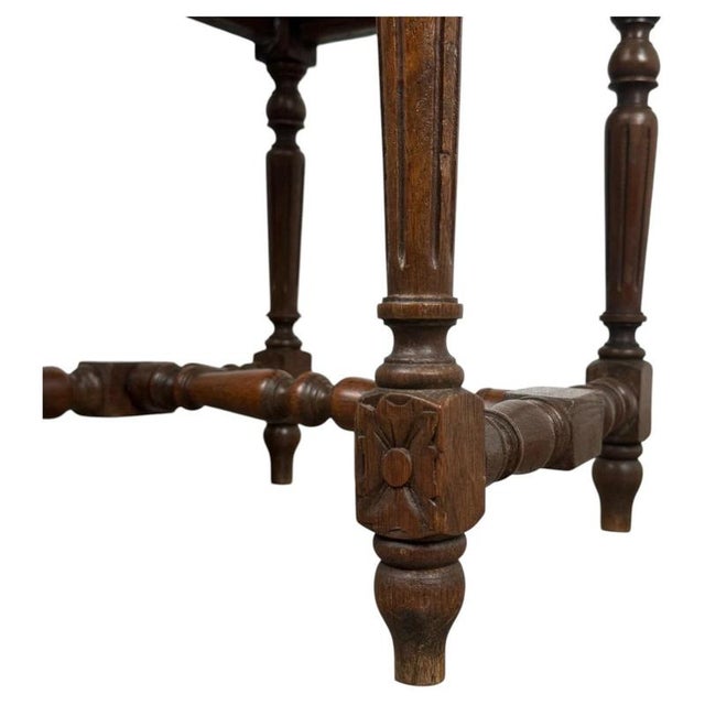 A beautifully crafted 19th century oak chair, dating to circa 1880, showcasing the exceptional craftsmanship and...