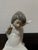 Design Plus Gallery presents the Porcelain Figurine Angel Wondering by Salvador Debón for Lladró. This is a classic...