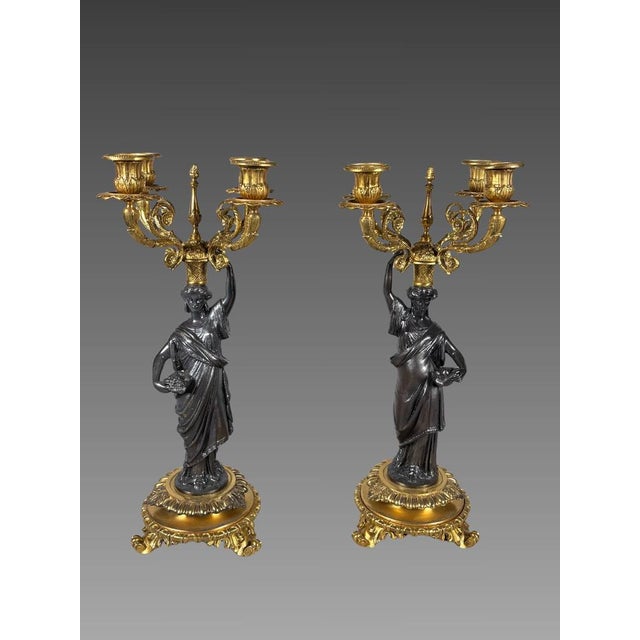 Pair of 19th-century caryatid candelabra French work from the Napoleon III period, circa 1850 The stems are formed by...