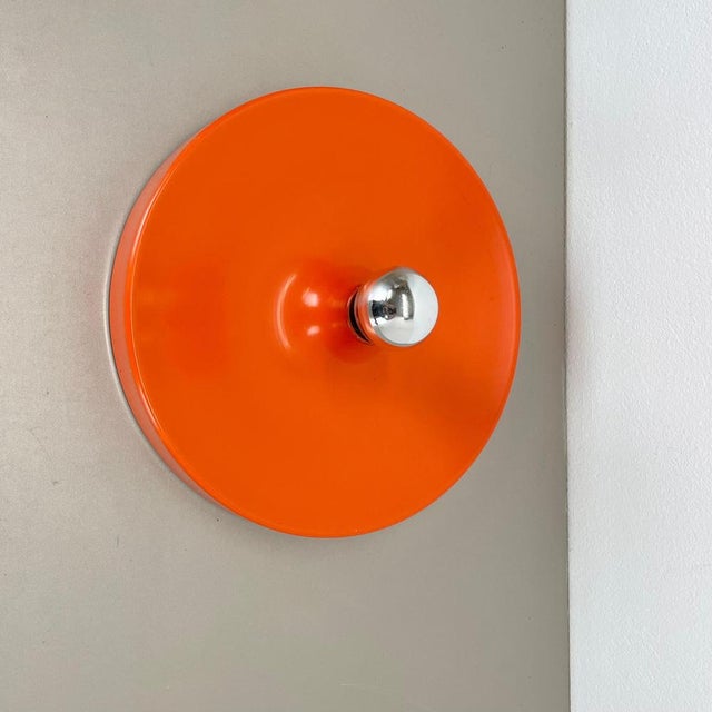 Article: orange tone wall light or ceiling light. Producer: Staff lights with super rare original producer sticker on the...
