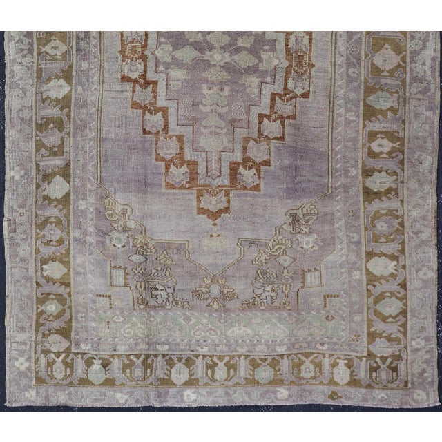 Measures: 5'8 x 9'5. Layered medallion Oushak vintage rug from Turkey with floral motifs. Keivan Woven Arts / rug TU-...