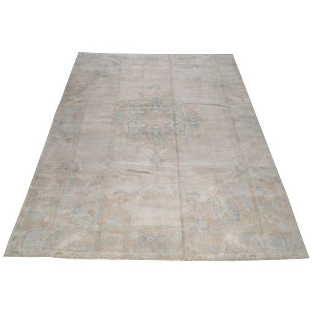 Hand-knotted with care using traditional rug making techniques, this wool rug blends timeless craftsmanship with a modern...