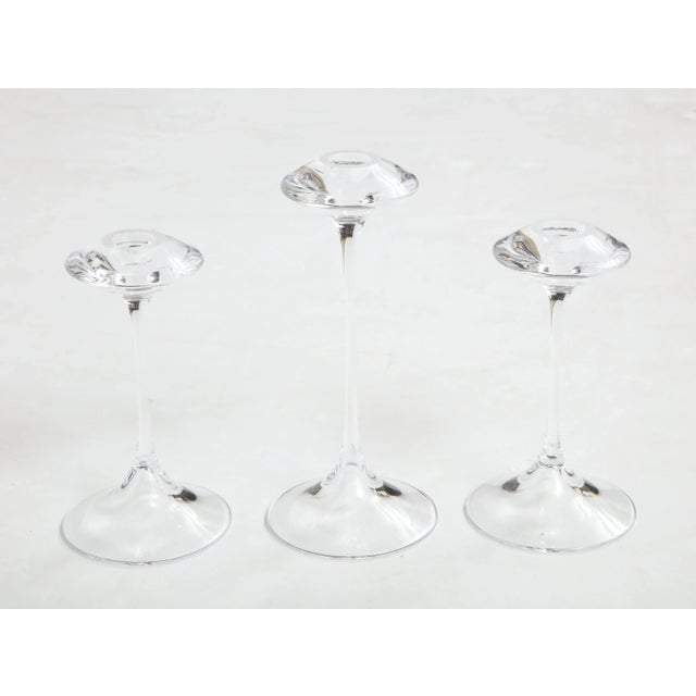 Stunning set of 3 Kjell Engman for Kosta Boda glass candlesticks. The two smaller candlesticks height is 7''.
