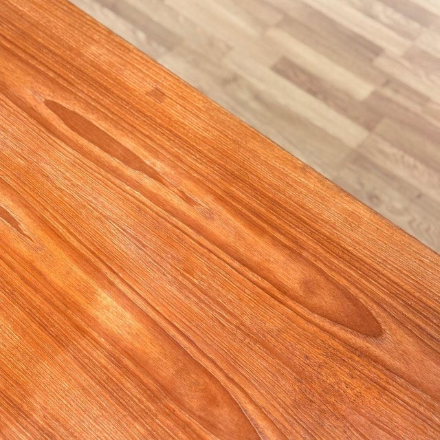 Dining table was manufactured in Denmark in the 1950s-60s . It is made of teak veneer on top surface. The dining table has...