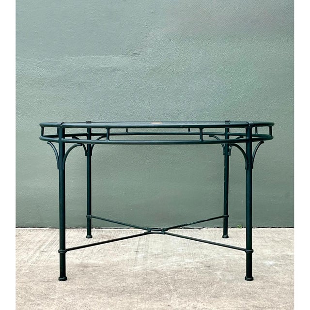 This elegant vintage Brown Jordan outdoor dining table from the iconic "Florentine" collection showcases a harmonious...