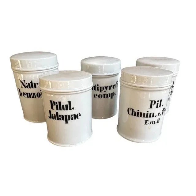A set of 5 antique German apothecary jars — no cracks or chips, nice decor. Each measures 2.75"W x 2.75"D x 4"H. Lovely...