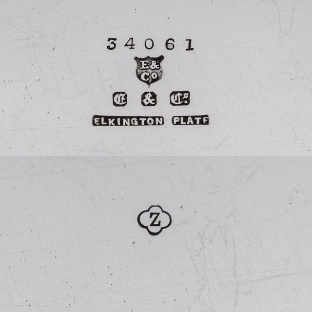 A superb 20th century art deco wine cooler or champagne bucket made by elkington & co. Featuring rounded, sphere-like...