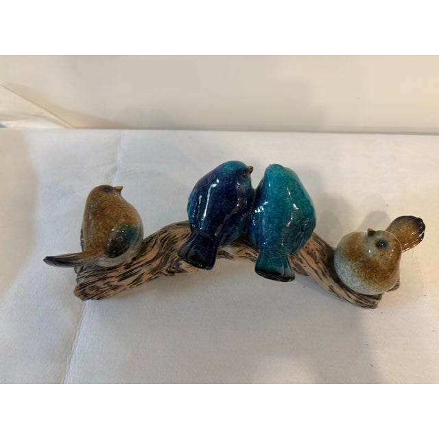 Four fat finches sitting on a log sculpture, lah lah la la lah! I could just almost make a child's sing-a-long to that...
