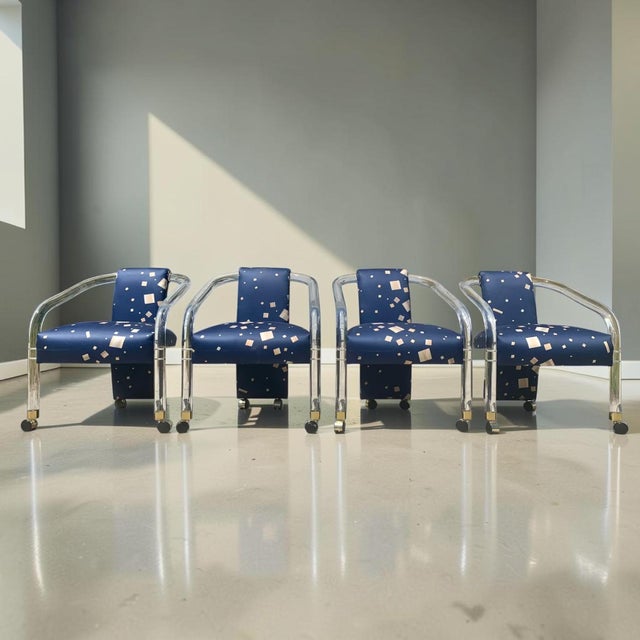 Stunning set of four vintage mid-century modern lucite dining chairs, in the manor of Charles Hollis Jones. This is an...