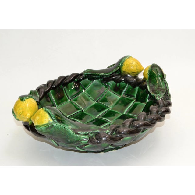 1970s Mid-Century Modern handcrafted ceramic, pottery Lemon Basket or fruit plate in glazed dark green and black with...