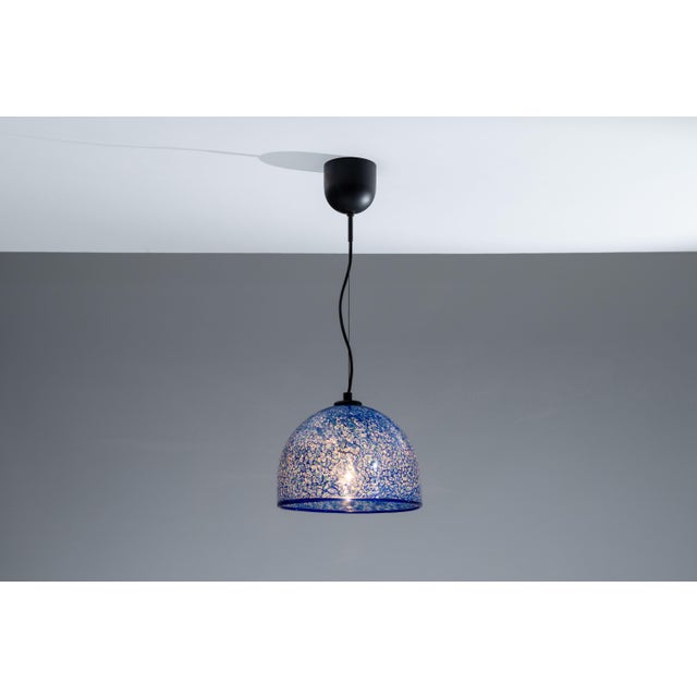 Rare ‘‘Neverrino’’ pendant designed by Gaetana Aulenti. Produced by Vistosi. Aulenti won the Grand International Prize for...