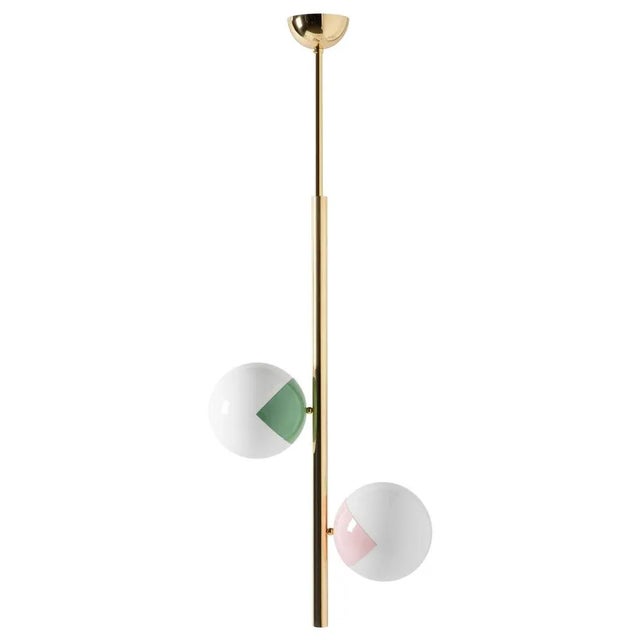 Pop-up chandelier by magic circus editions dimensions: w 58 x h 155 cm diameter sphere 25 cm materials: smooth brass,...