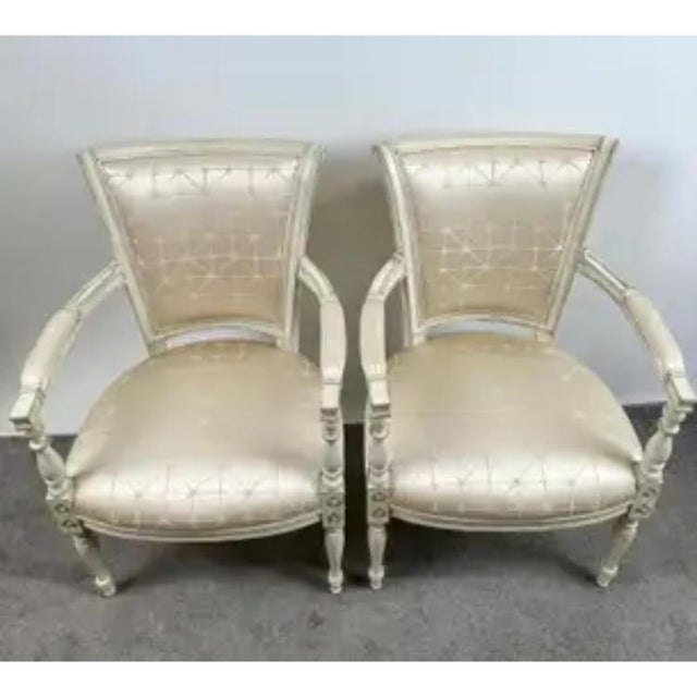 French Academic Revival Louis XVI Style Off-White Painted Chair C 1930's, a Pair This elegant pair of French Academic...